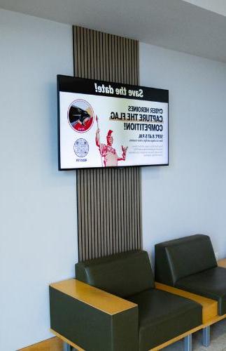 Image of a digital screen in L3Harris Commons lobby